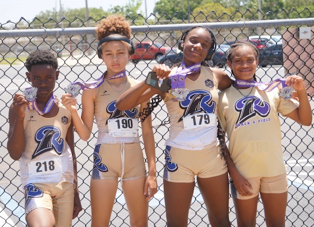 Kids Holding Their Medals