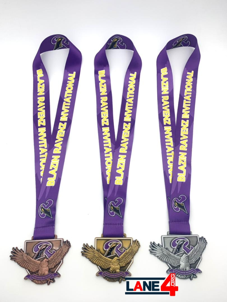 Three medals from the Blazin' Ravenz Invitational, showcasing bronze, silver, and gold placements, each with an eagle design and purple ribbons.